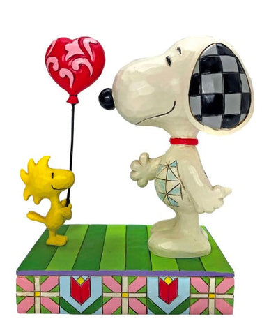 Woodstock giving Snoopy Heart